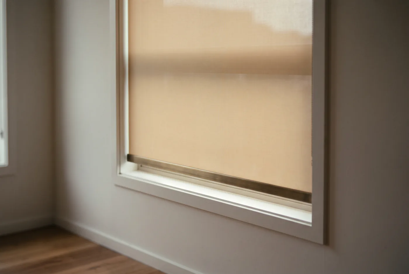 A finished blind fitted neatly into a window recess